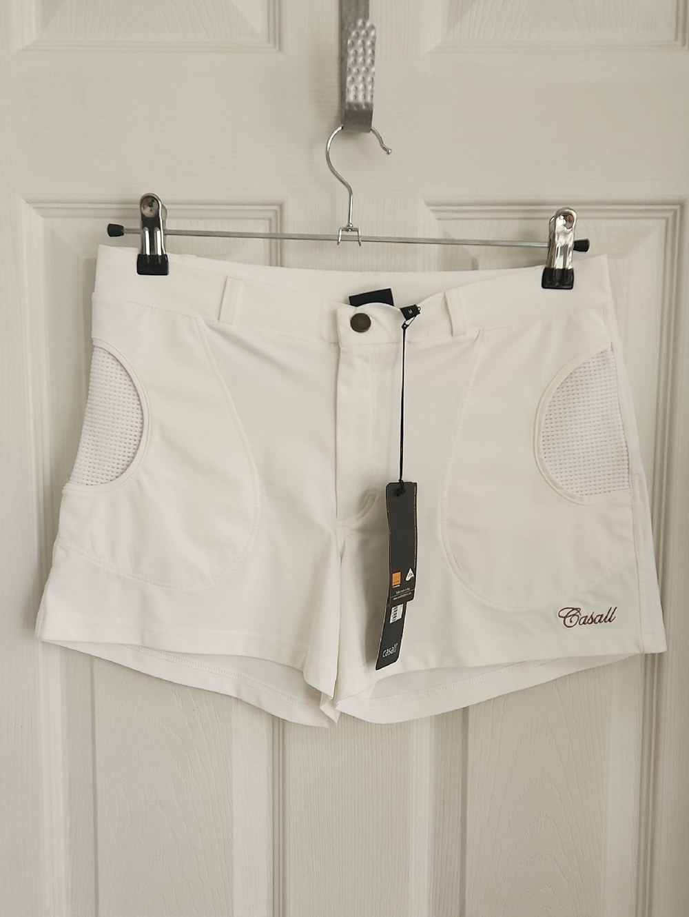 Women's White Athletic Shorts with Mesh Pocket Detailing